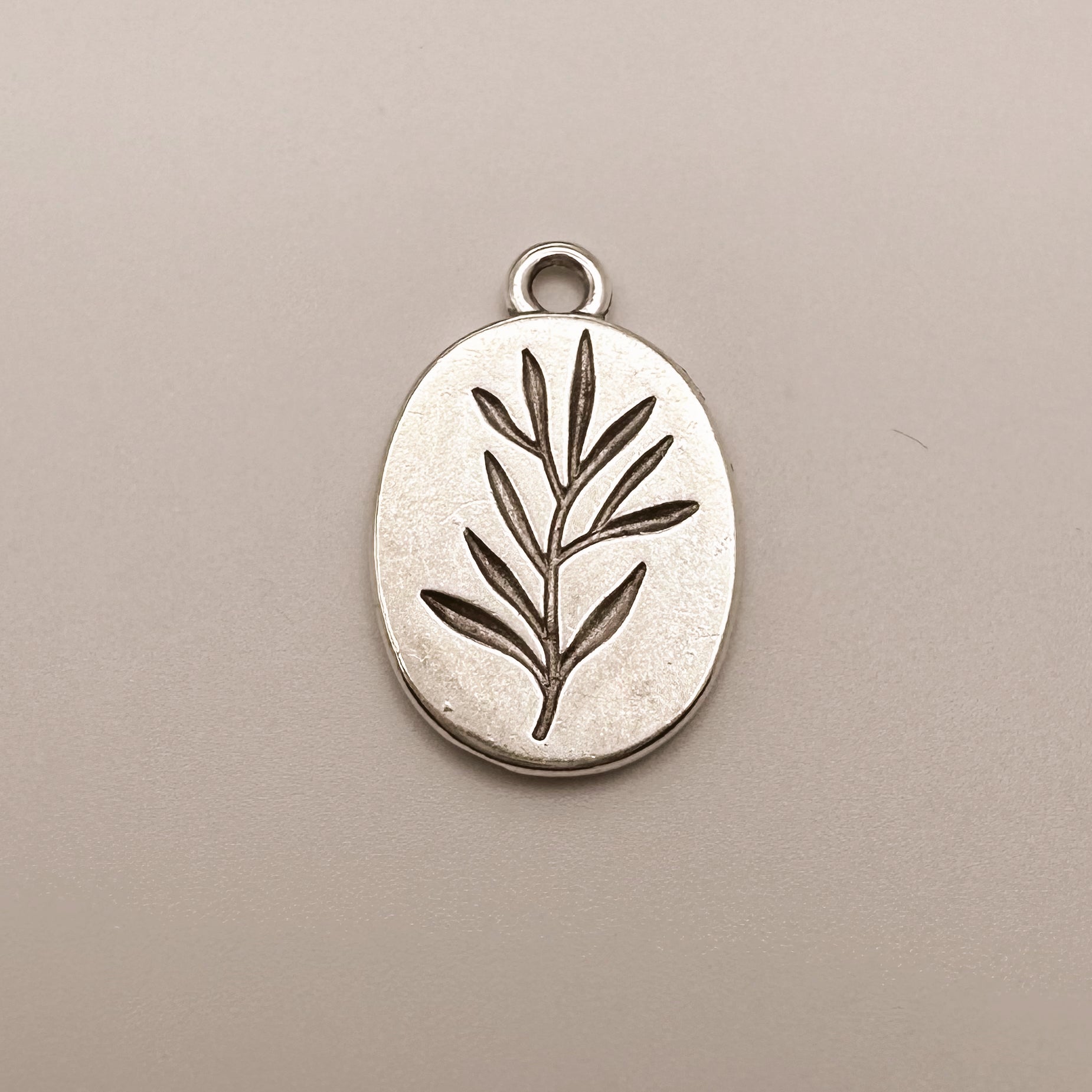 Silver Plant Coin Charm