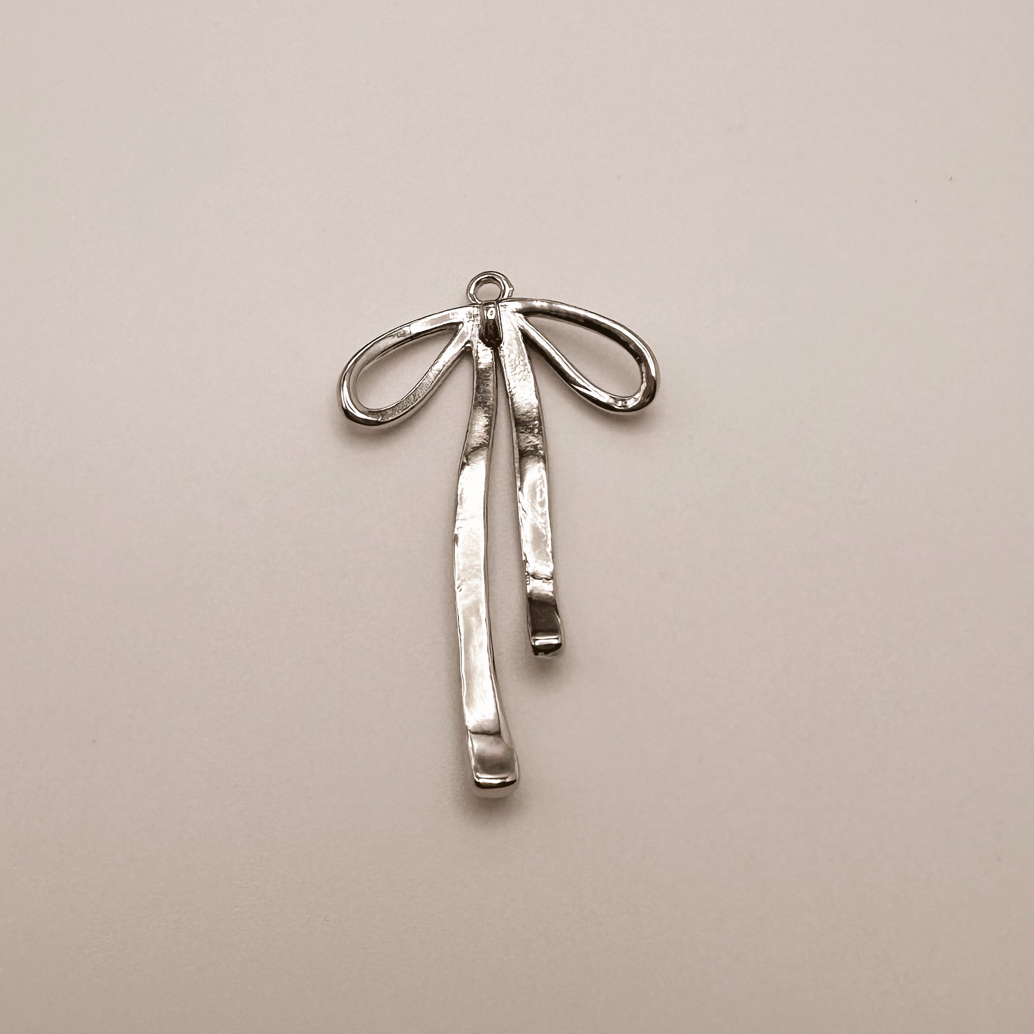 Silver Bow Charm